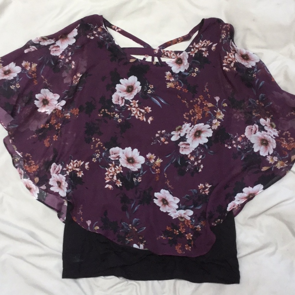 Women’s blouse with floral overlay